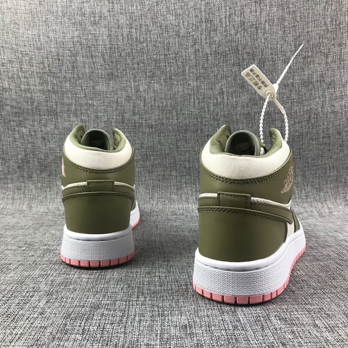 Air Jordan 1 High Sneakers in Olive Green White Pink - product image from the listing.