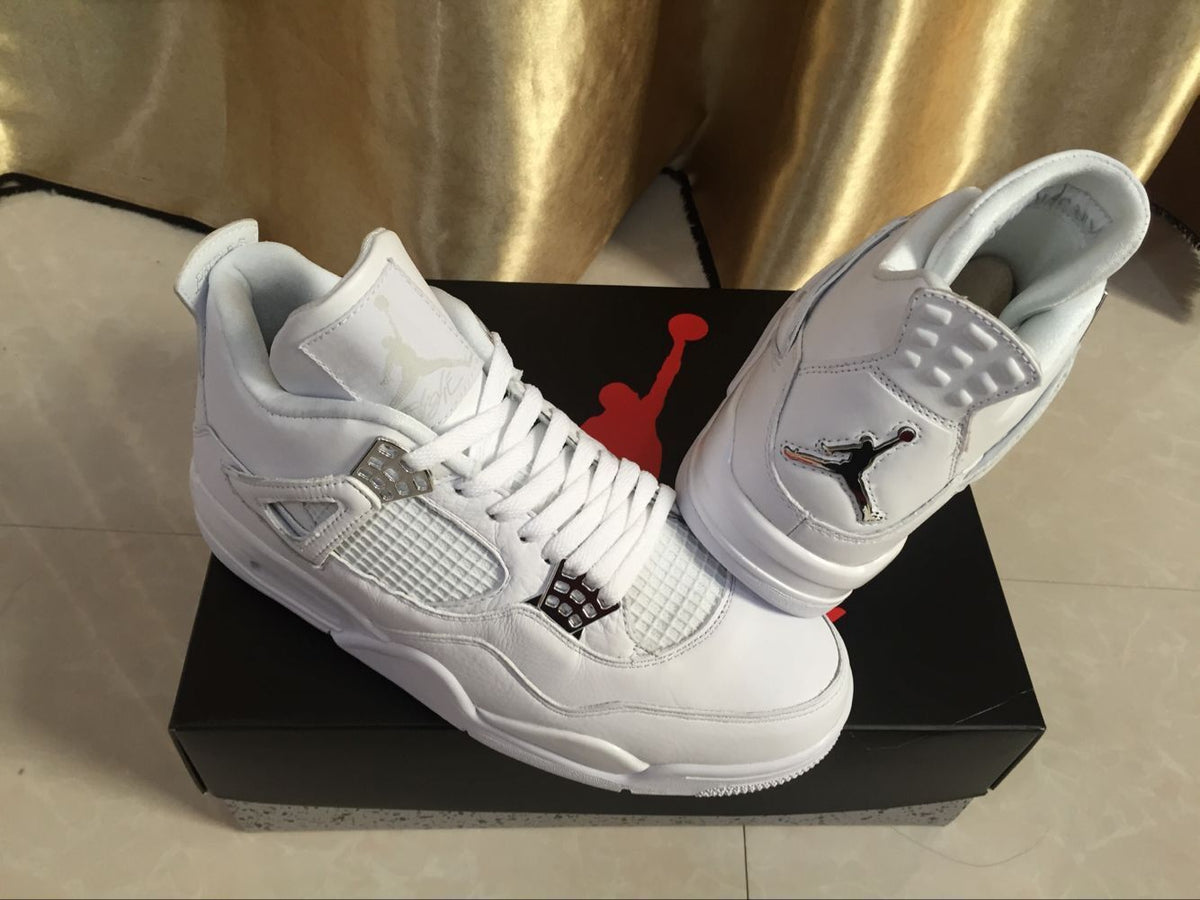 Air Jordan 4 Retro White High-Top Sneakers - product image from the listing.