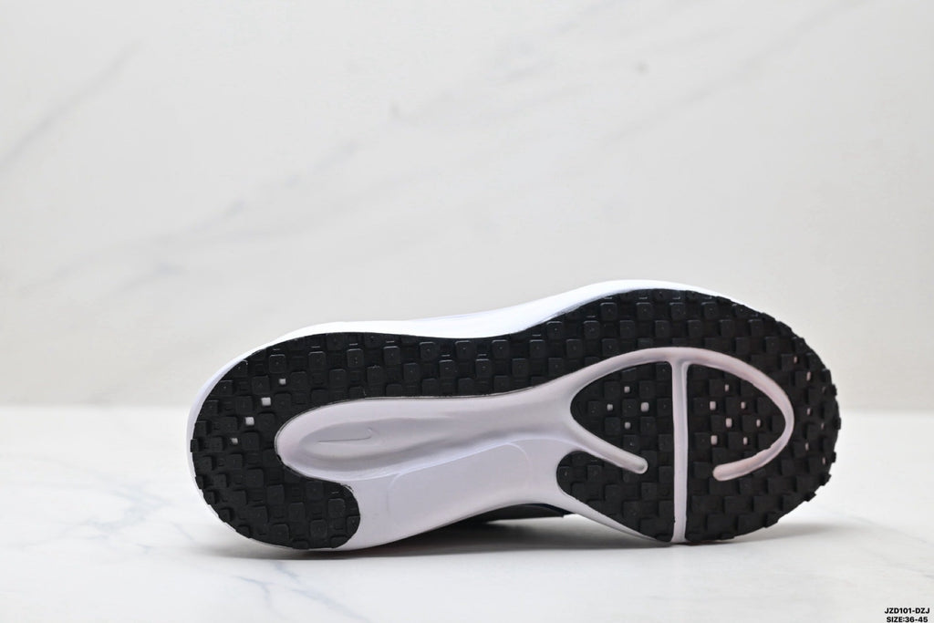 Nike Revolution 8 Running Shoes, in Light Blue and Navy - product image from the listing.