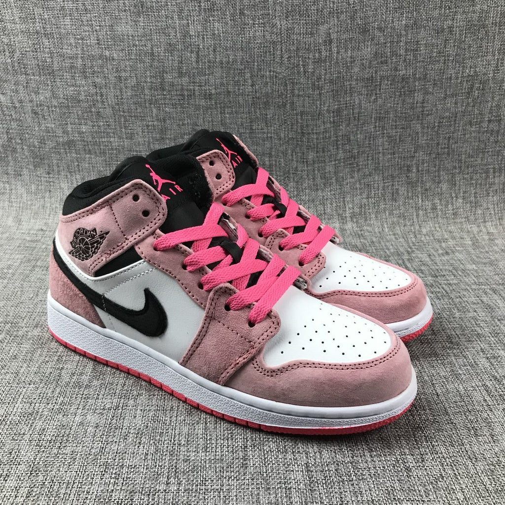 Air Jordan 1 Mid Sneakers in Pink 852542-801 - product image from the listing.