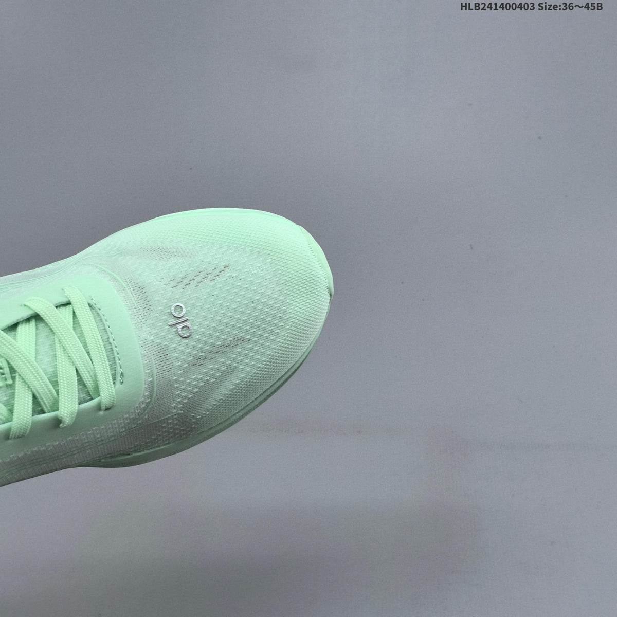Mint Green Alo Yoga Alo Runner Low-Top Sneakers - product image from the listing.