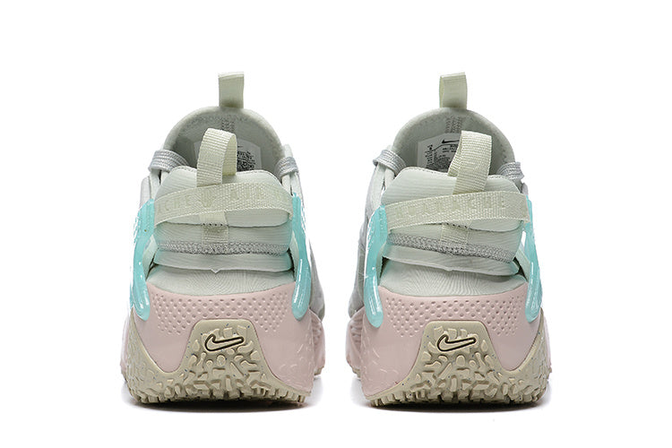 Nike Air Huarache Sneakers in Light Grey Pink Aqua - product image from the listing.