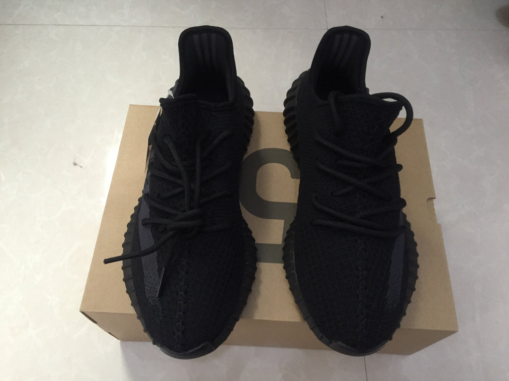Adidas Yeezy Boost 350 V2 Sneakers in Black Knit - product image from the listing.