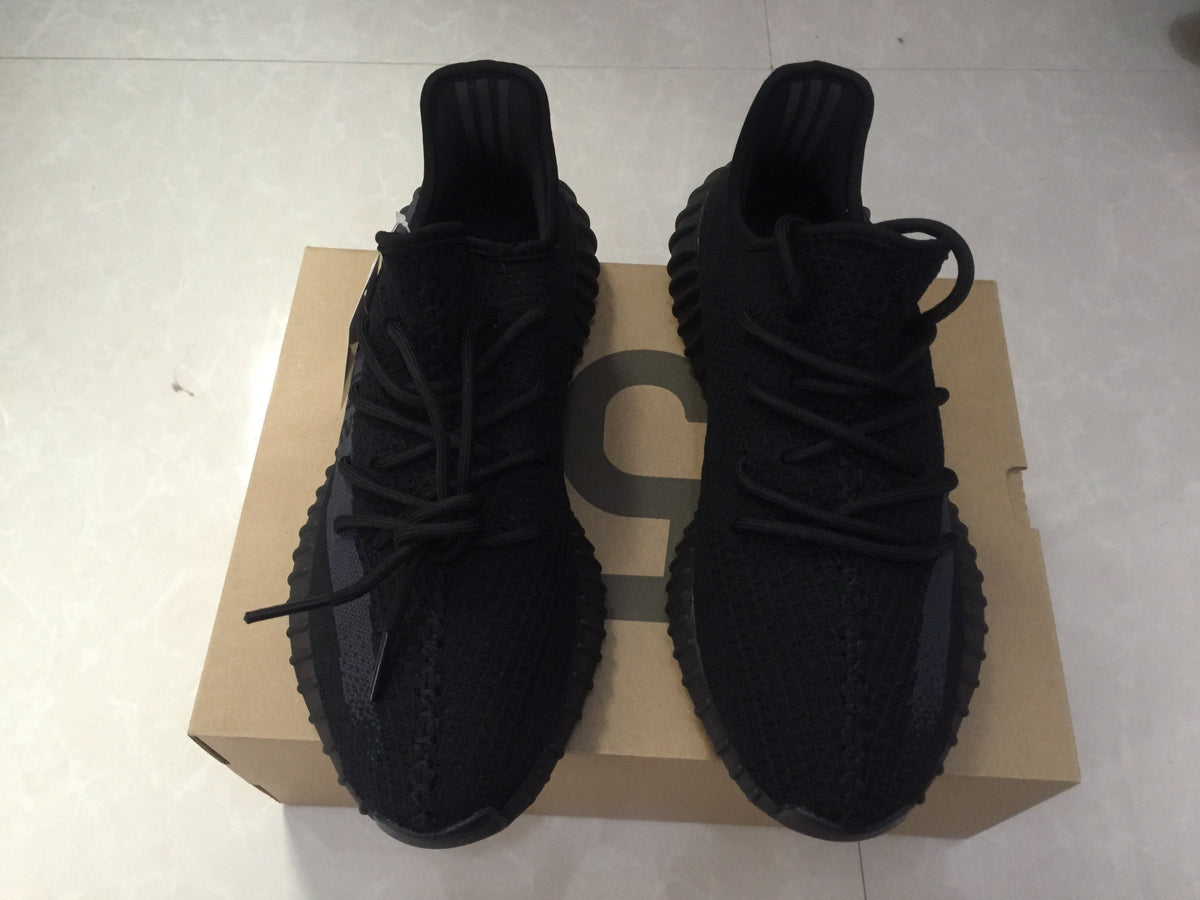 Adidas Yeezy Boost 350 V2 Sneakers in Black Knit - product image from the listing.