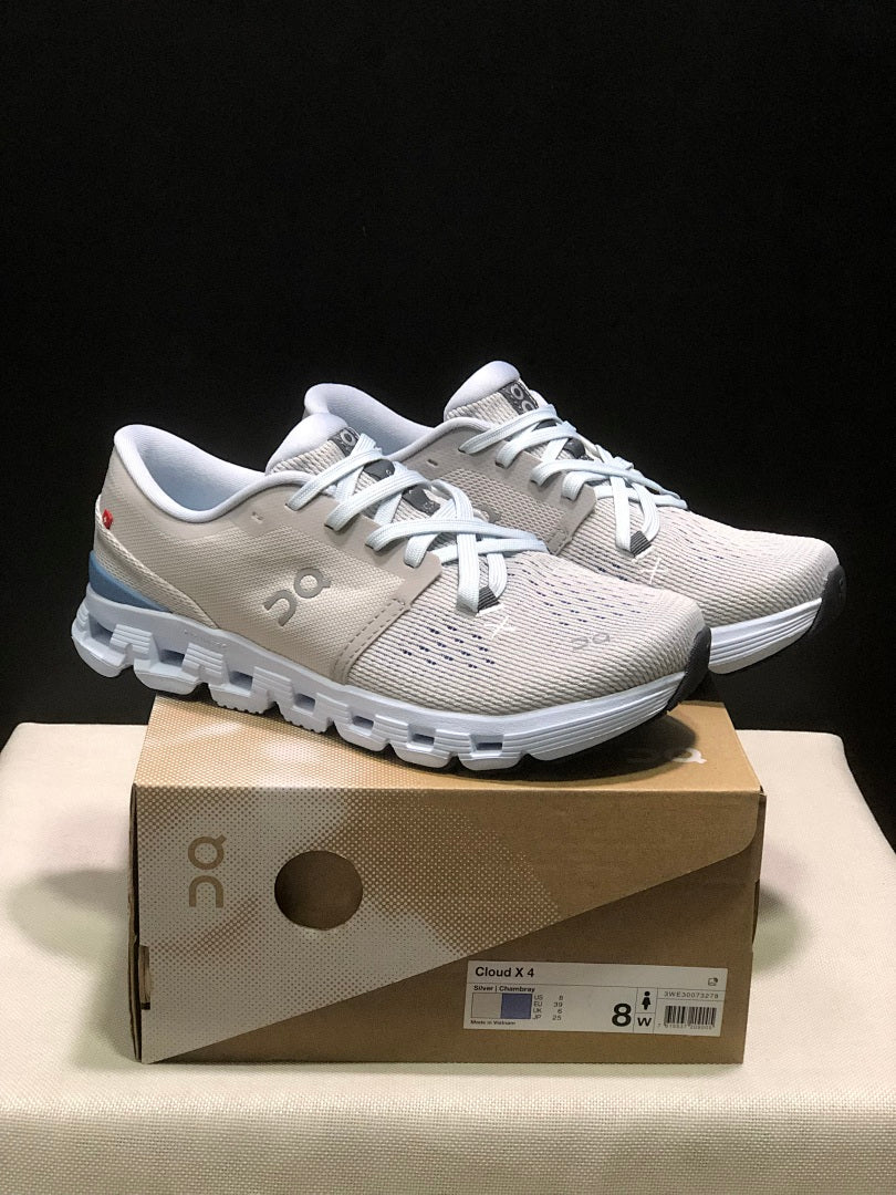 Silver and Blue On Cloud X 4 Sneakers - product image from the listing.