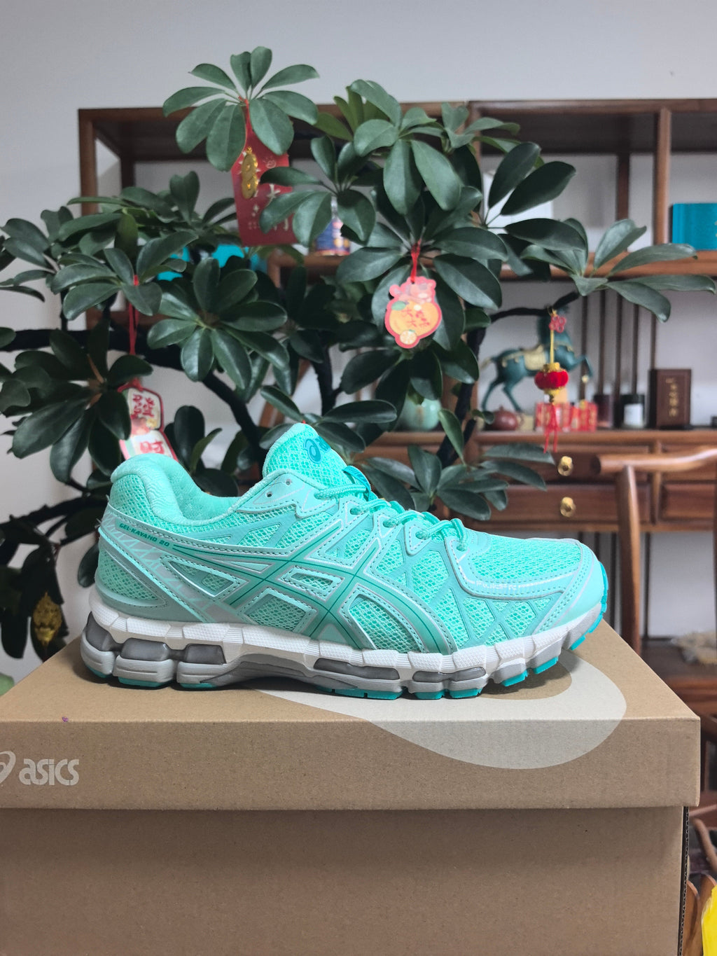 ASICS GEL-KAYANO 20 Sneakers in Mint Green - product image from the listing.