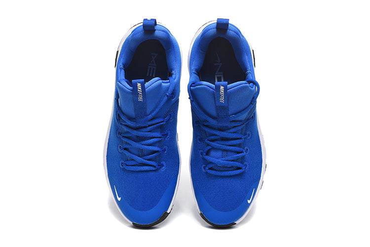 Nike Free Run Sneakers in Blue and White - product image from the listing.