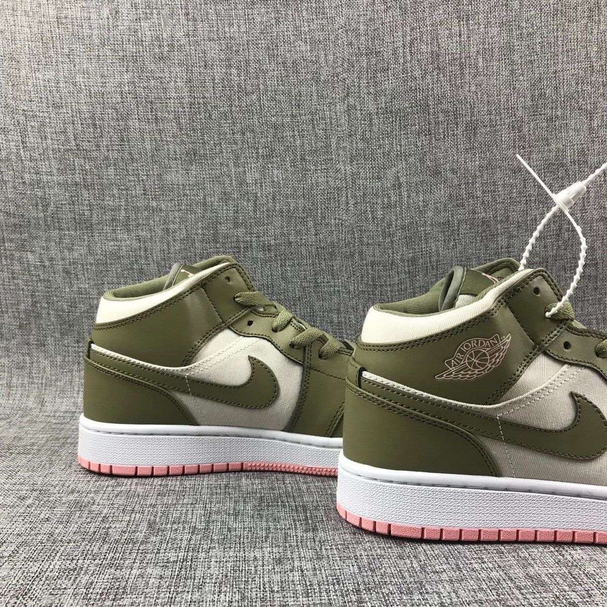 Air Jordan 1 High Sneakers in Olive Green White Pink - product image from the listing.