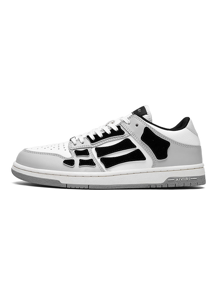 AMIRI Gray and White Low-Cut Sneakers with Black Accents - product image from the listing.