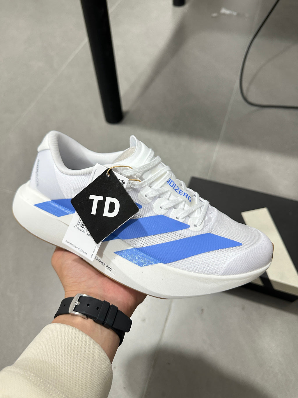 Adidas Lightstrike Pro Running Shoes in White Blue JS4454 - product image from the listing.