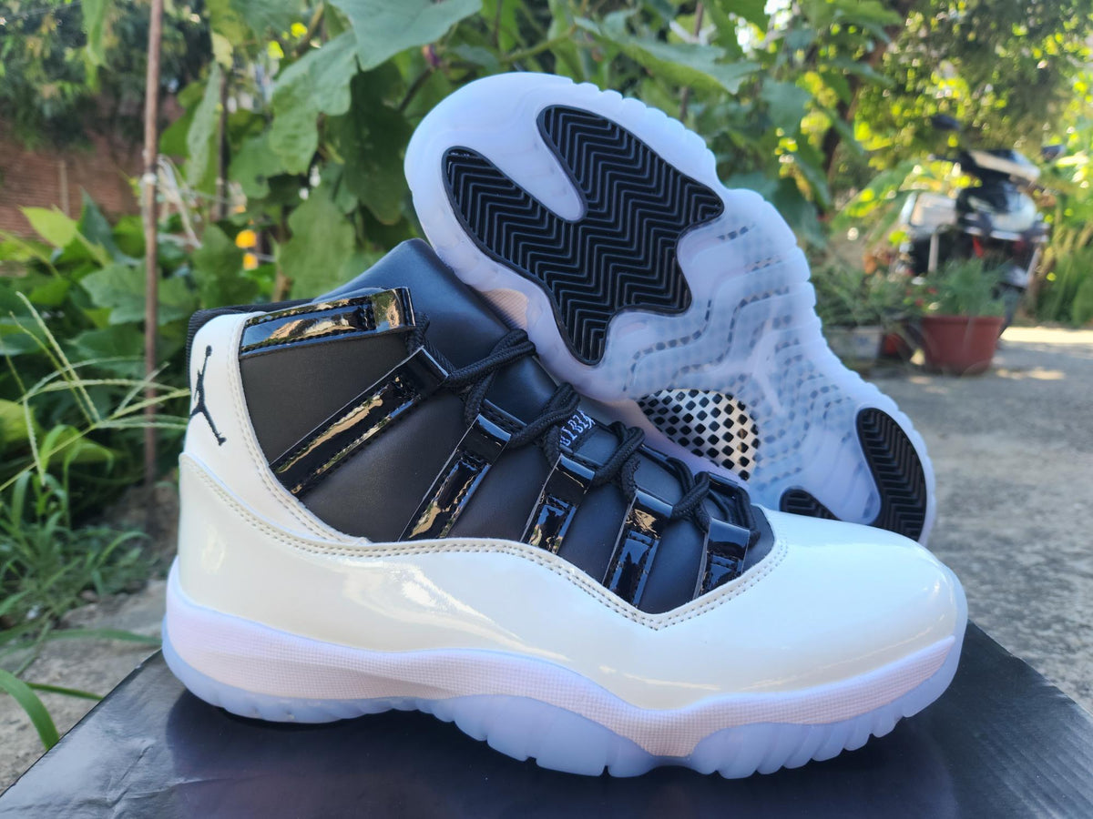 Air Jordan 11 Retro in White/Black - product image from the listing.