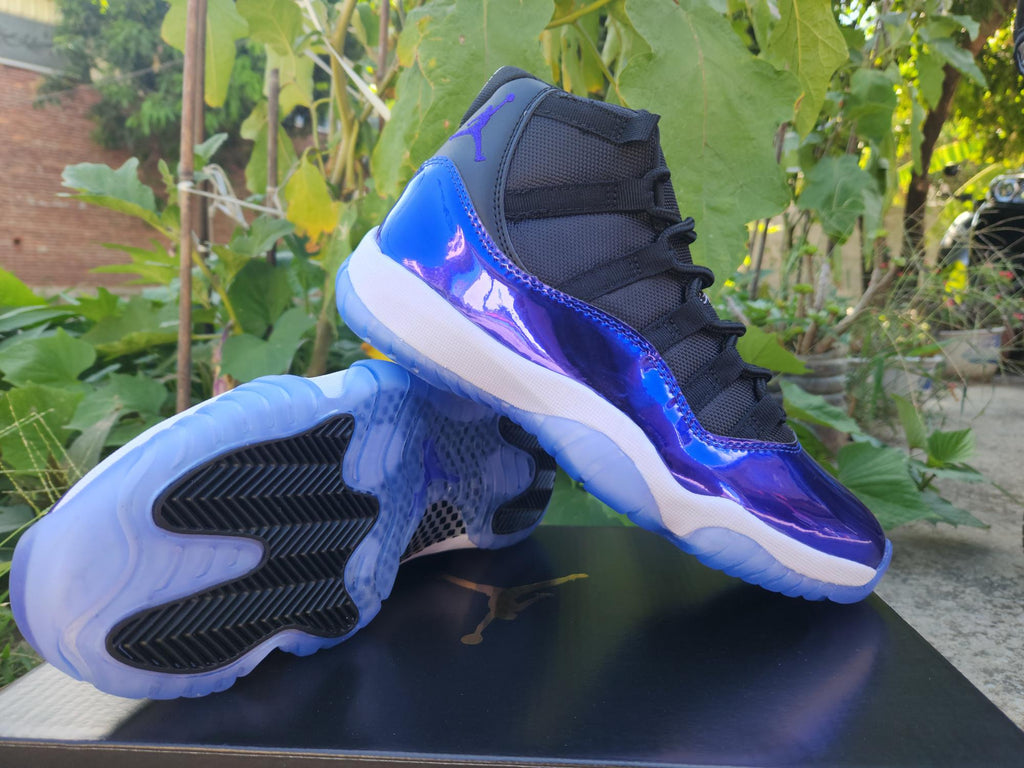 Air Jordan 11 Retro in Black/Blue - product image from the listing.