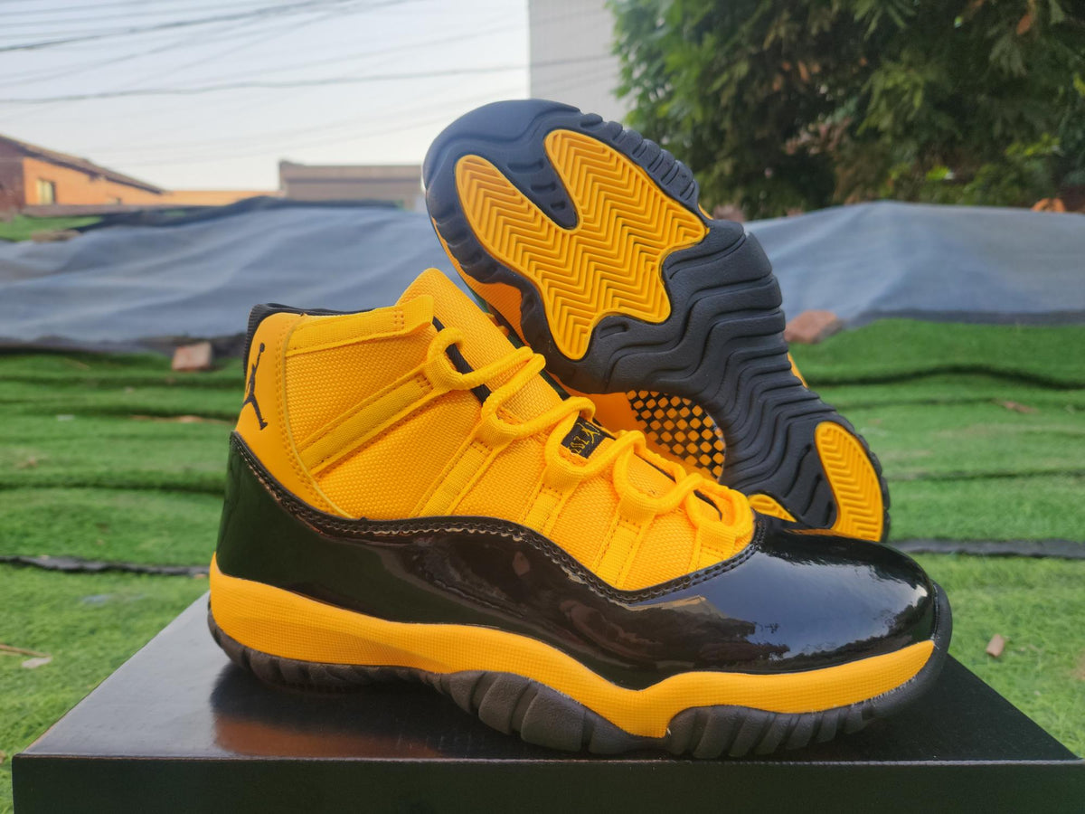 "Orange/Yellow/Black" Air Jordan 11 Retro - product image from the listing.