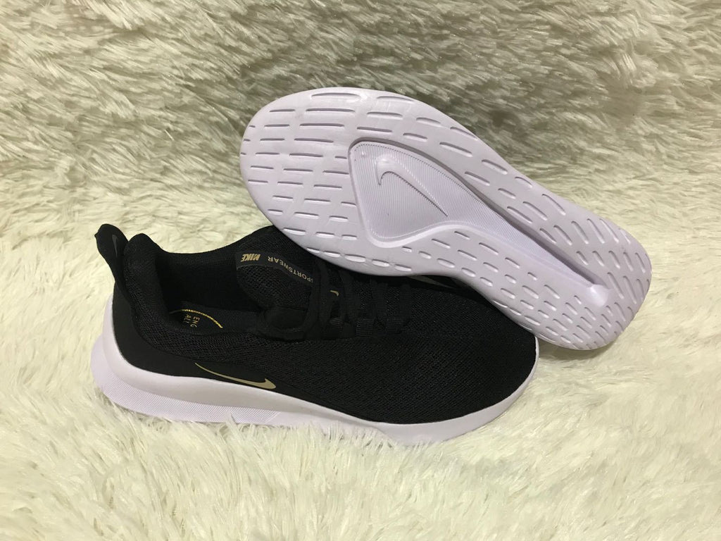 Nike Runallday 2 Running Shoes in Black and White - product image from the listing.