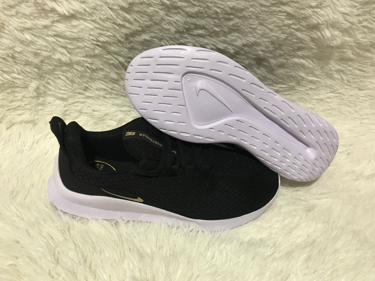 Nike Runallday 2 Running Shoes in Black and White - product image from the listing.