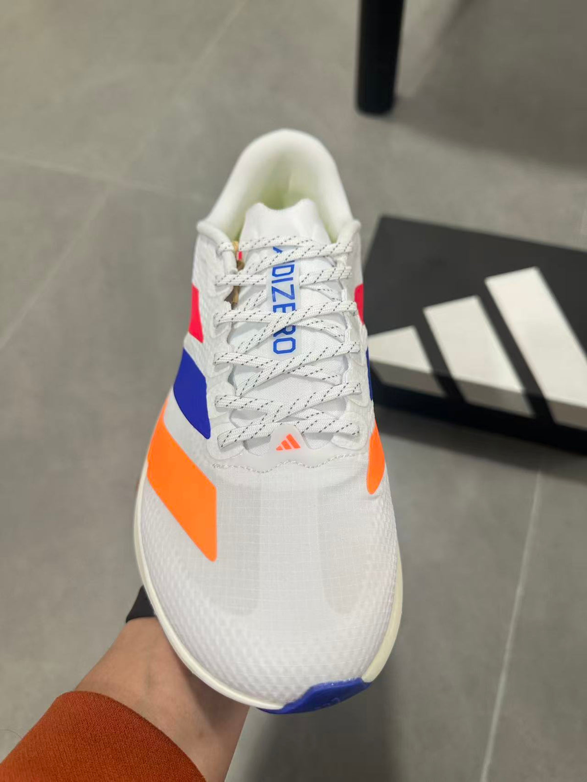Nike Lightstrike Pro Running Shoes in White Blue Orange KI4454 - product image from the listing.