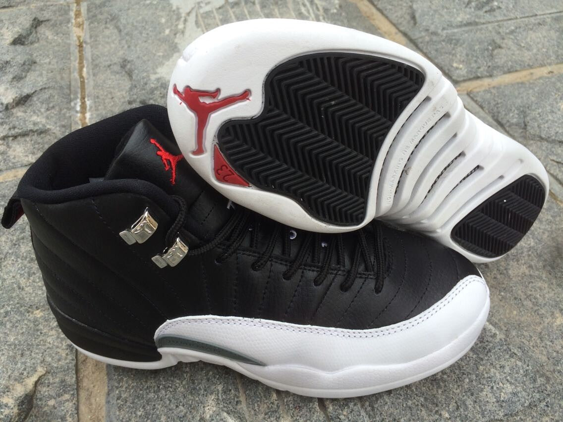Women's Air Jordan 12 High-Top Sneakers, Black and White - product image from the listing.