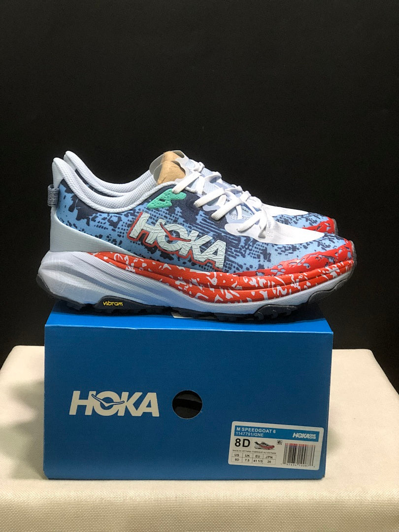 HOKA Speedgoat 6 Trail Running Shoes, in Blue and Orange - product image from the listing.