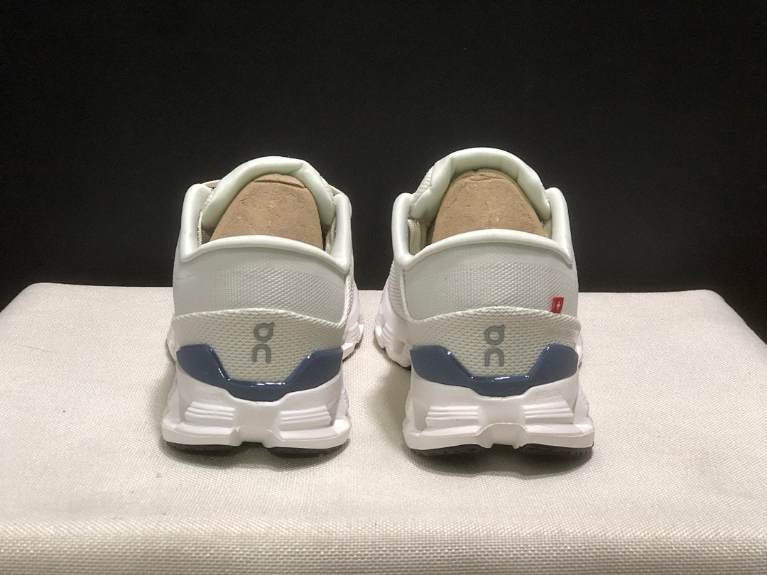 On Cloud X 4 Sneakers in Ivory and Blue - product image from the listing.