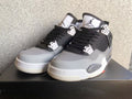 Air Jordan 4 Black Oreo Sneakers in Grey and Black - product image from the listing.