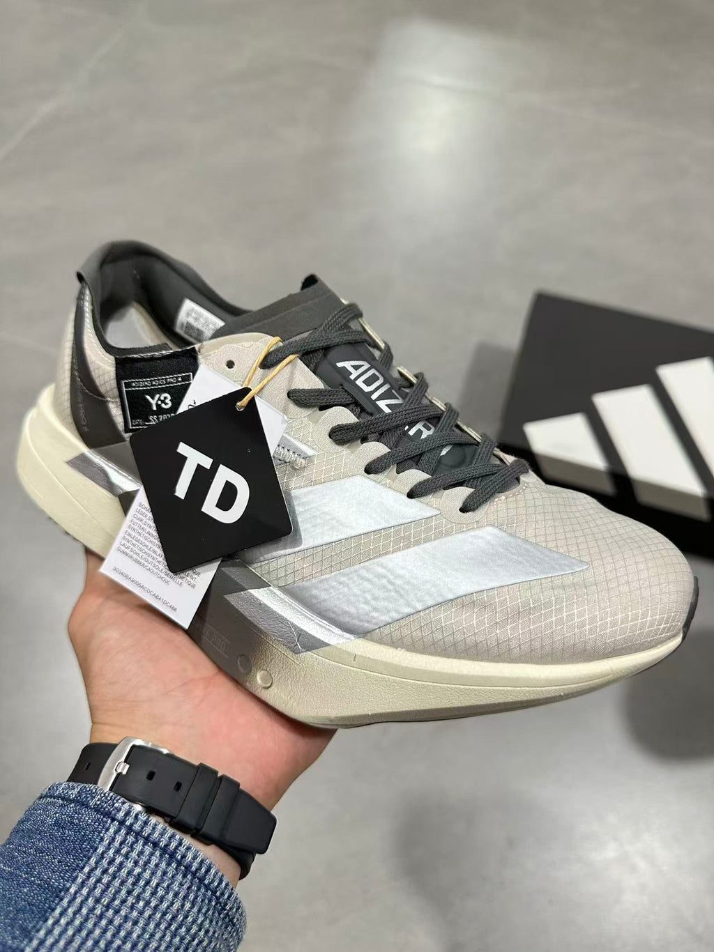 adidas Adizero Adios Pro 4 Running Shoes in White Black - product image from the listing.