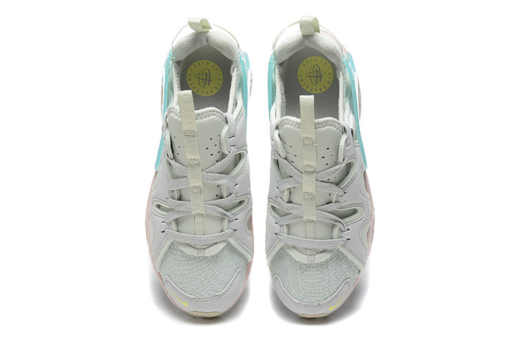 Nike Air Huarache Sneakers in Light Grey Pink Aqua - product image from the listing.