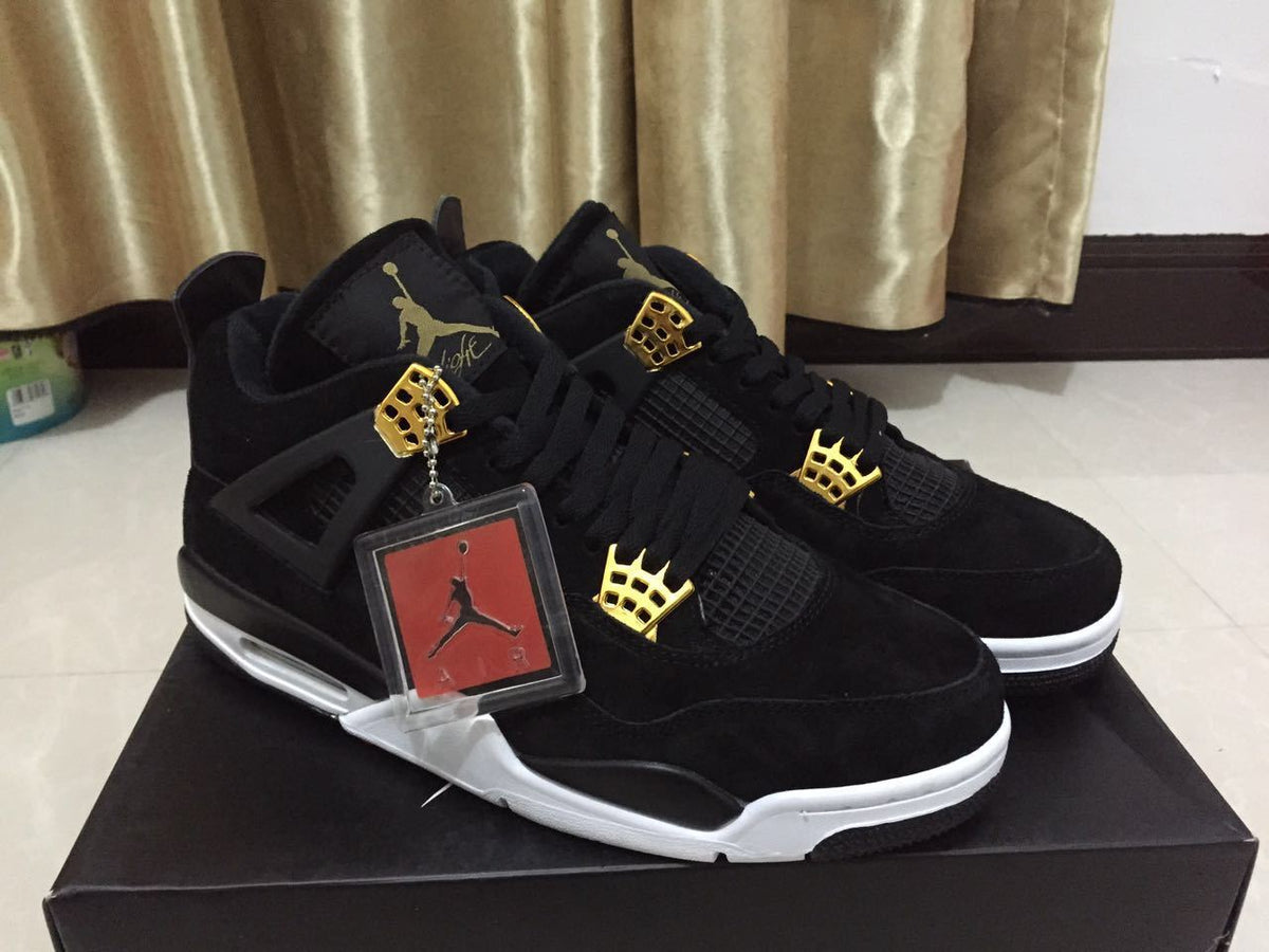 Jordan 4 High-Top Sneakers in Black and Gold - product image from the listing.