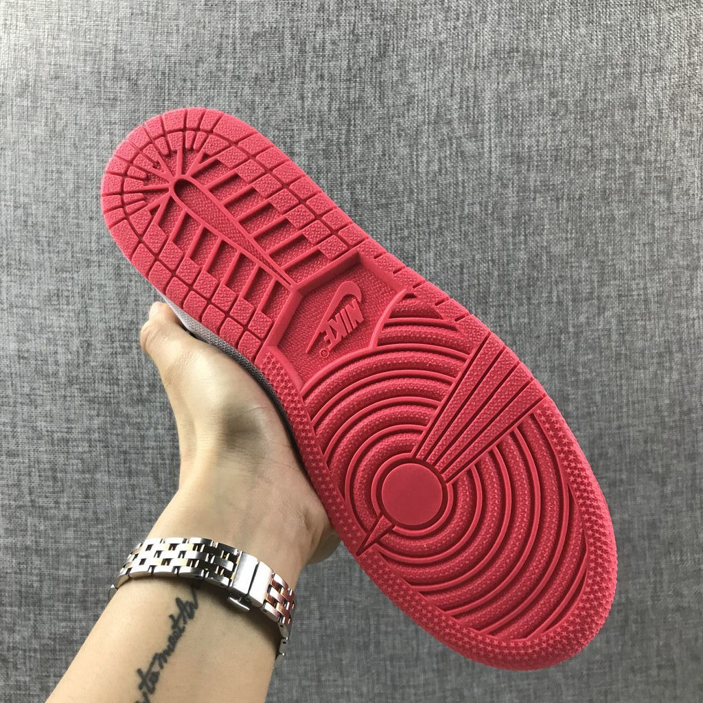 Air Jordan 1 Mid Sneakers in Pink 852542-801 - product image from the listing.