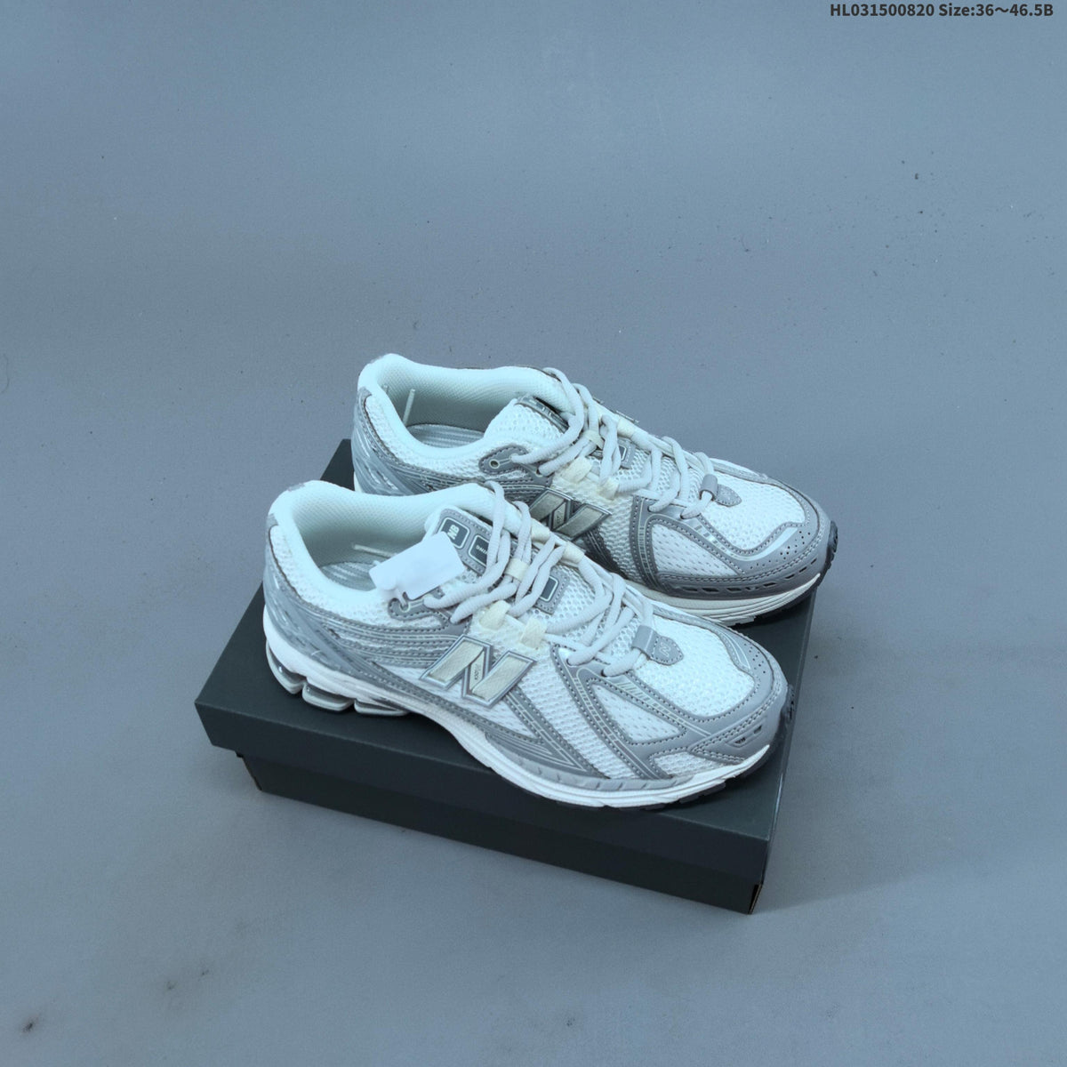 New Balance 1906R Sneakers in White Silver U1906RJM - product image from the listing.