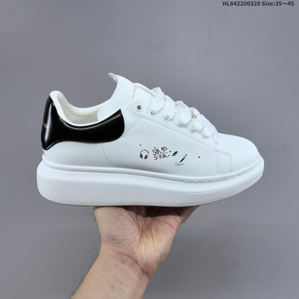 Alexander McQueen Oversized Low-Top Sneakers, in White and Black - product image from the listing.
