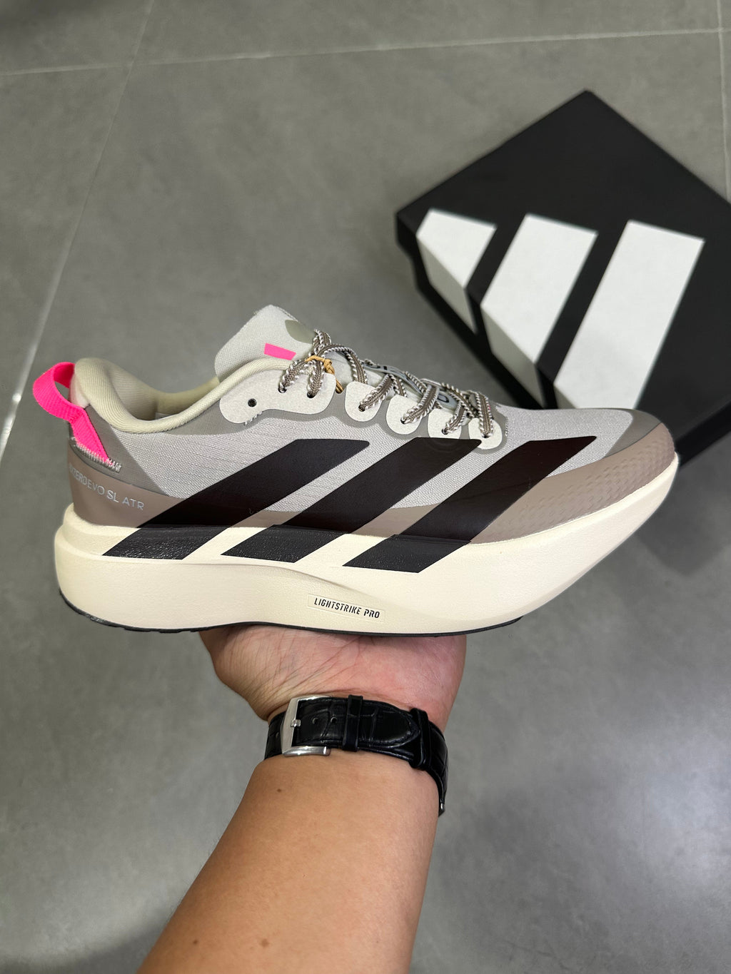 Adidas Adizero SL 2 Running Shoes, in Beige and Black KI5181 - product image from the listing.