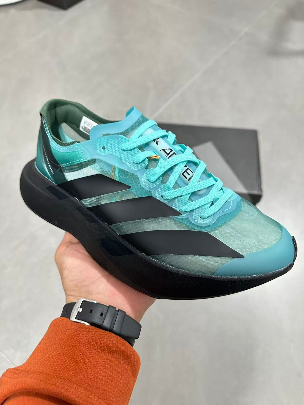 Nike Air Max Scorpion Flyknit Sneakers, in Turquoise and Black IH5588 - product image from the listing.