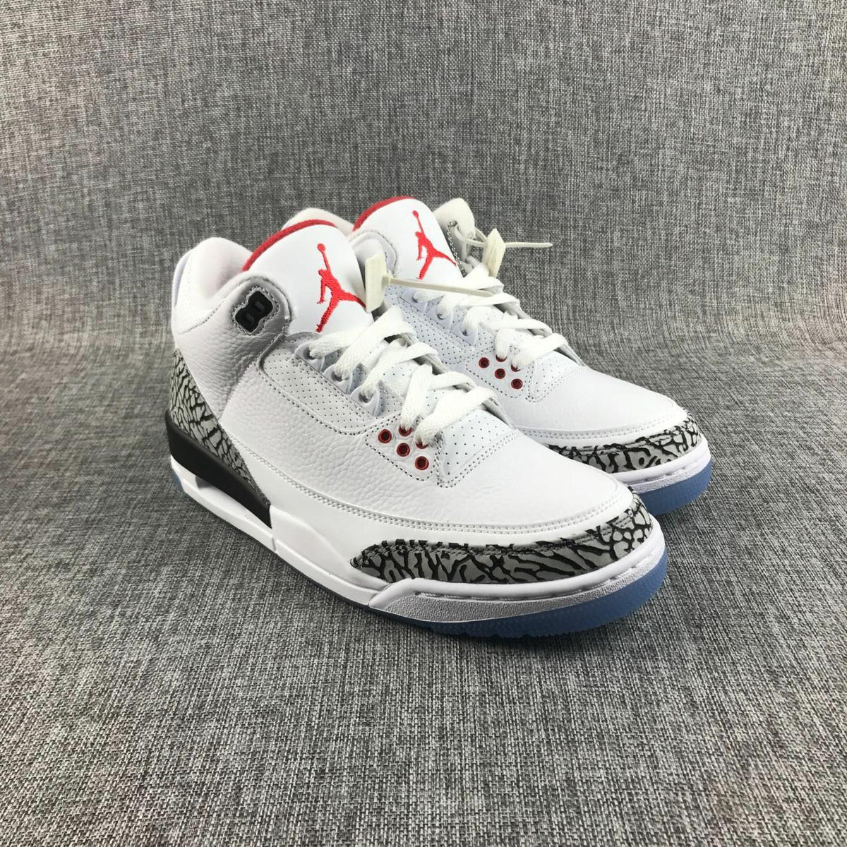 Air Jordan 3 White Cement Sneakers with Translucent Blue Sole - product image from the listing.