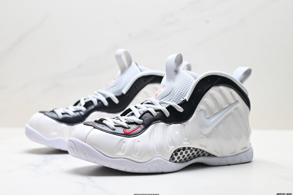 Nike Air More Uptempo Basketball Sneakers in White and Black - product image from the listing.