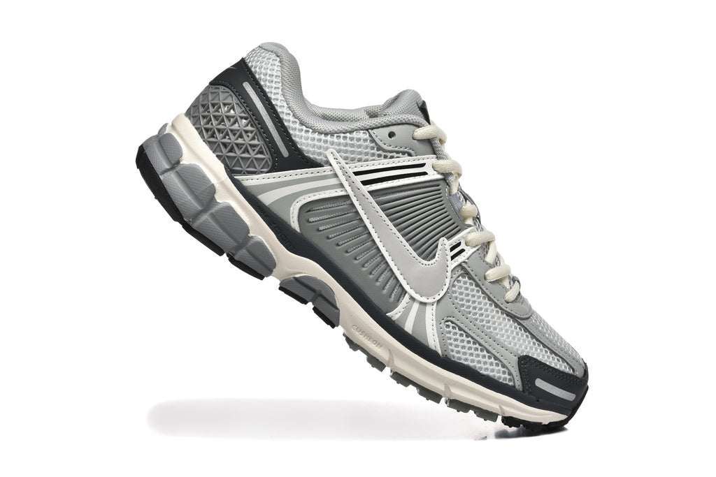 Grey and White Nike Zoom Vomero 5 Sneakers - product image from the listing.