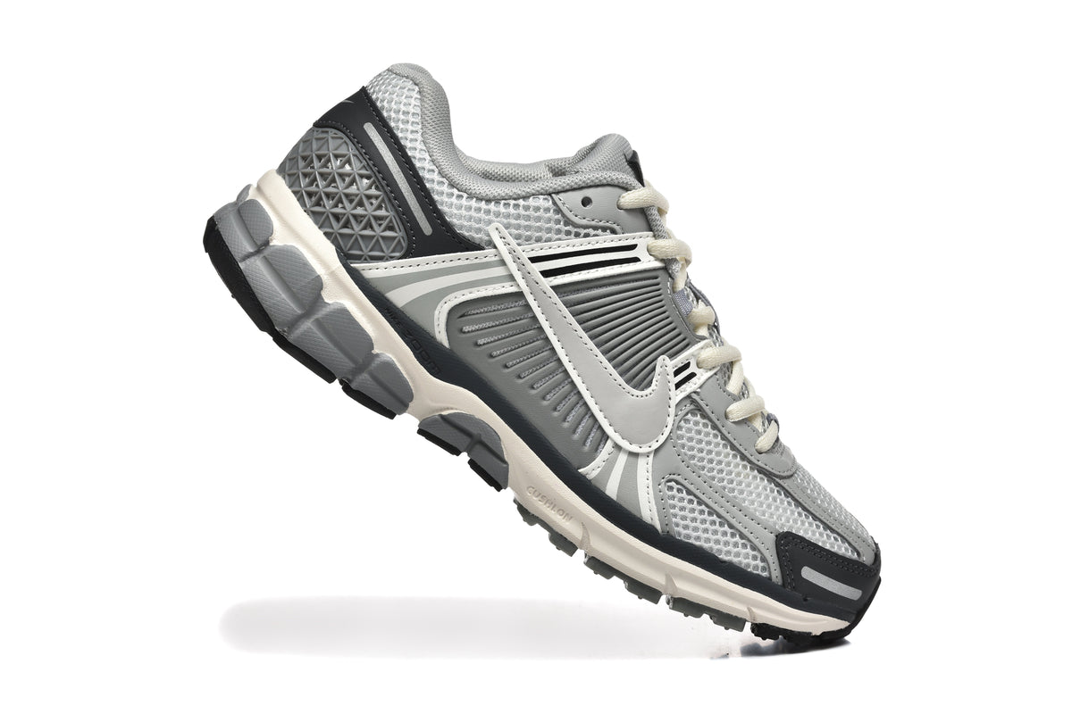 Grey and White Nike Zoom Vomero 5 Sneakers - product image from the listing.