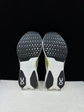 On Cloudboom Strike LS Running Shoes in White Lime - product image from the listing.