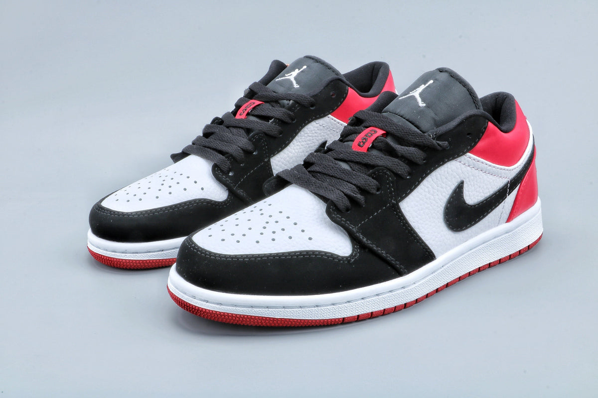 Jordan 1 Low Black Toe Sneakers in Black White Red - product image from the listing.