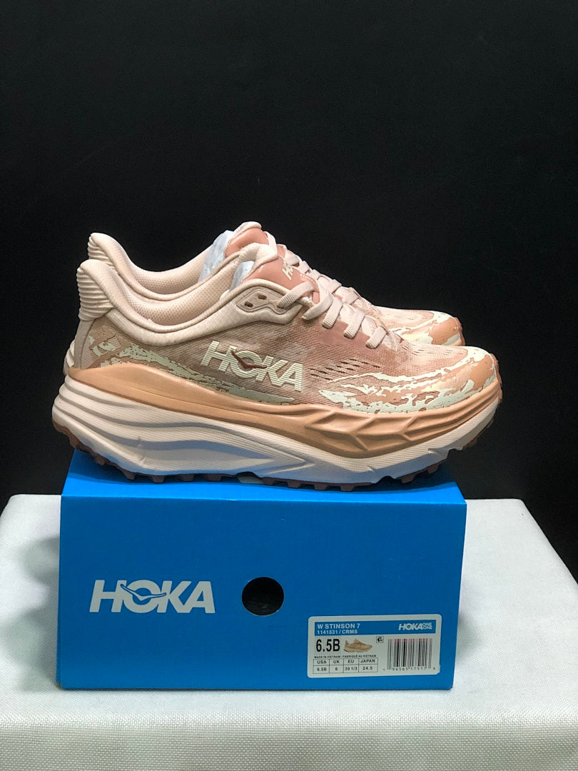 HOKA Stinson 7 Trail Running Shoes in Blush and in Cream - product image from the listing.