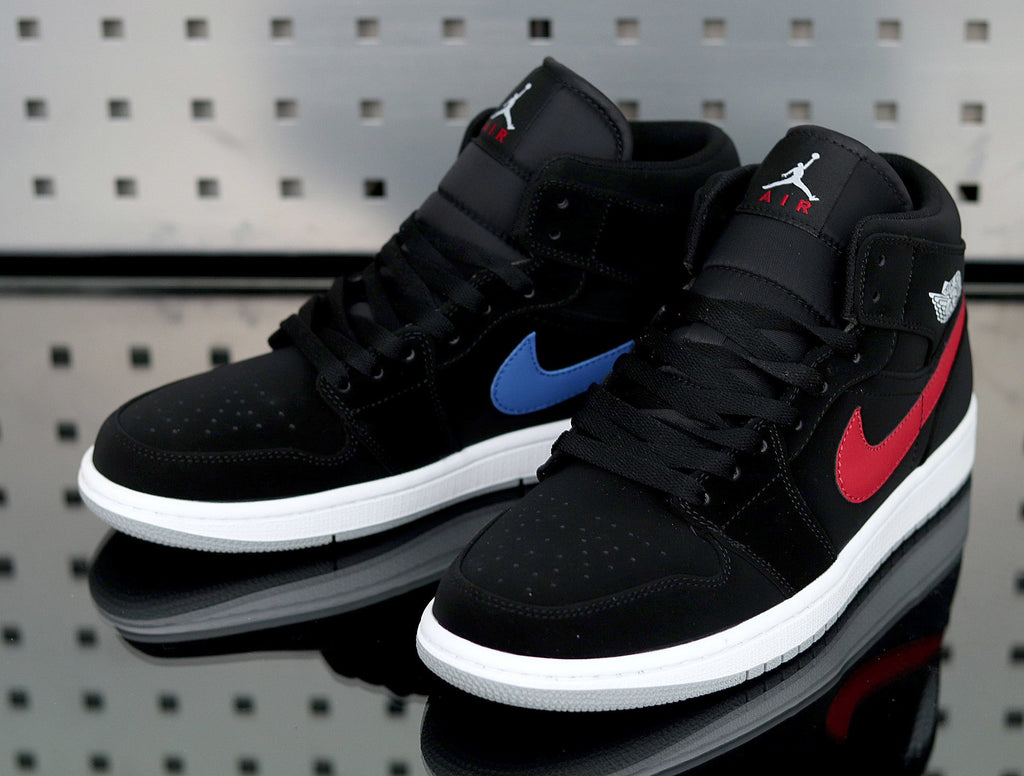 Jordan 1 Retro High Sneakers in Black Red Blue 554725-065 - product image from the listing.