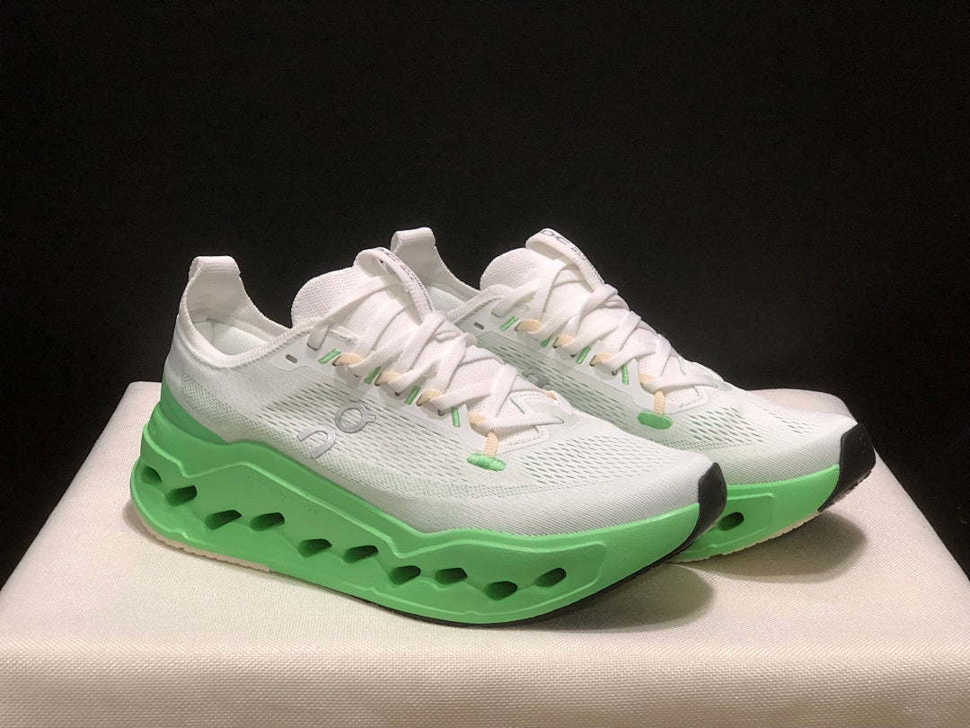 On Cloudsurfer Max Running Shoes in White Green - product image from the listing.