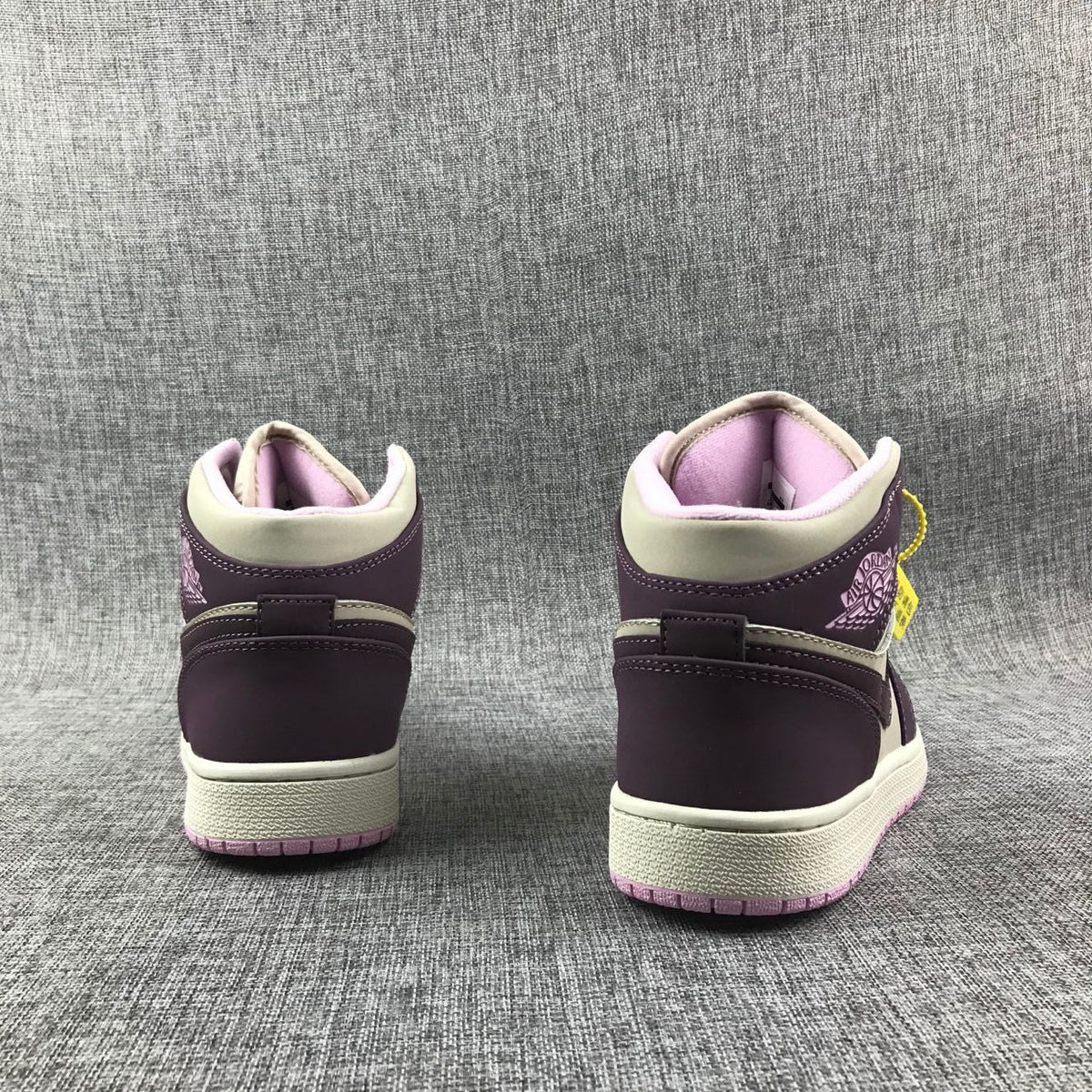 Air Jordan 1 Retro High OG Sneakers in White Purple - product image from the listing.