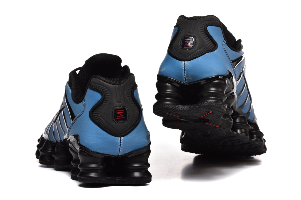 Black and Pink Nike Shox TL Sneakers - product image from the listing.