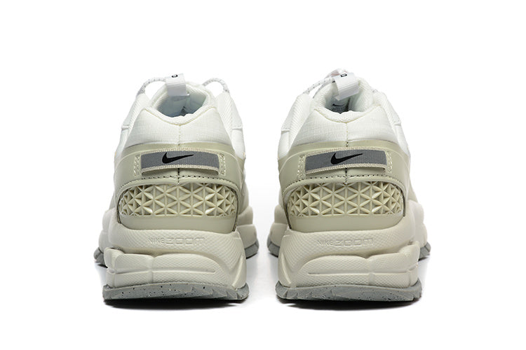 Nike Vomero Sneakers in White and Sage in Green - product image from the listing.