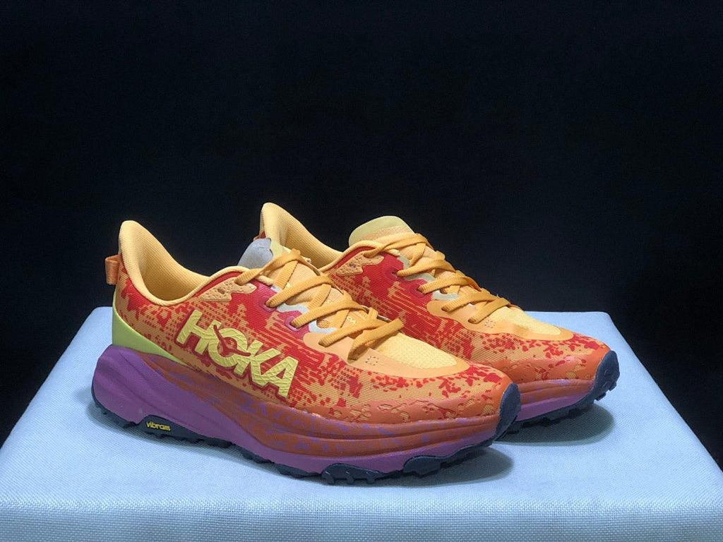 HOKA Speedgoat 6 Trail Running Shoes, in Orange and Yellow - product image from the listing.