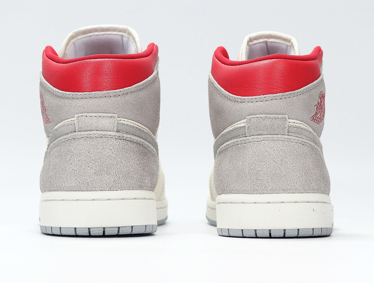 Jordan 1 Retro High OG Sneakers in Light Smoke Grey CT3443-100 - product image from the listing.