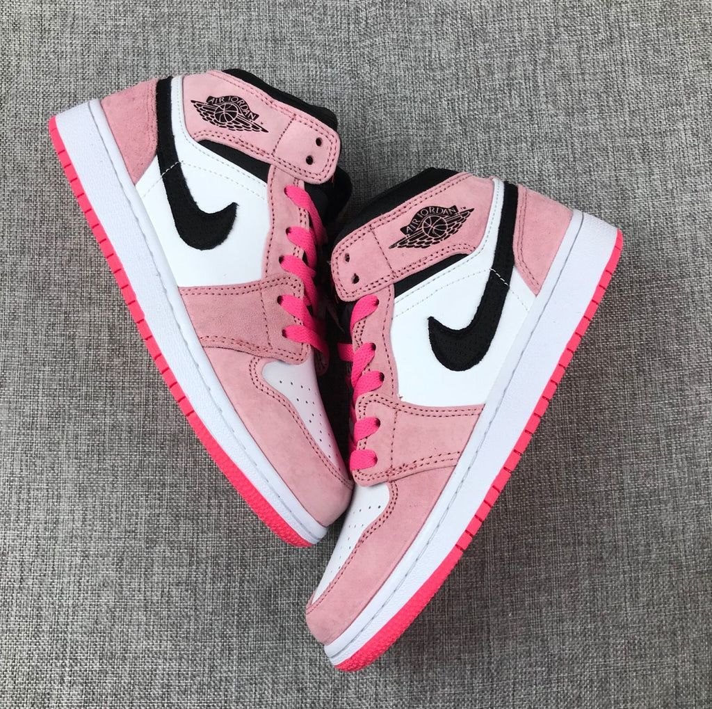 Air Jordan 1 Mid Sneakers in Pink 852542-801 - product image from the listing.