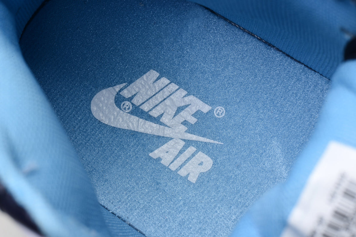 Blue and White Jordan 1 High Paul Edition Navy Sneakers - product image from the listing.