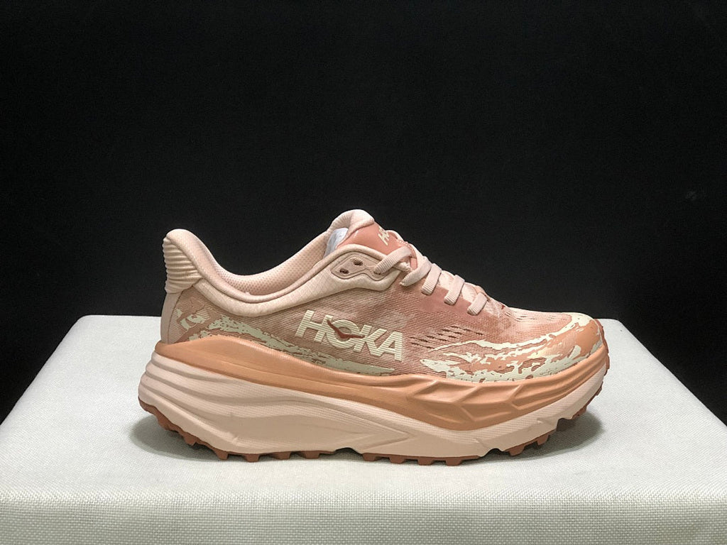 HOKA Stinson 7 Trail Running Shoes in Blush and in Cream - product image from the listing.