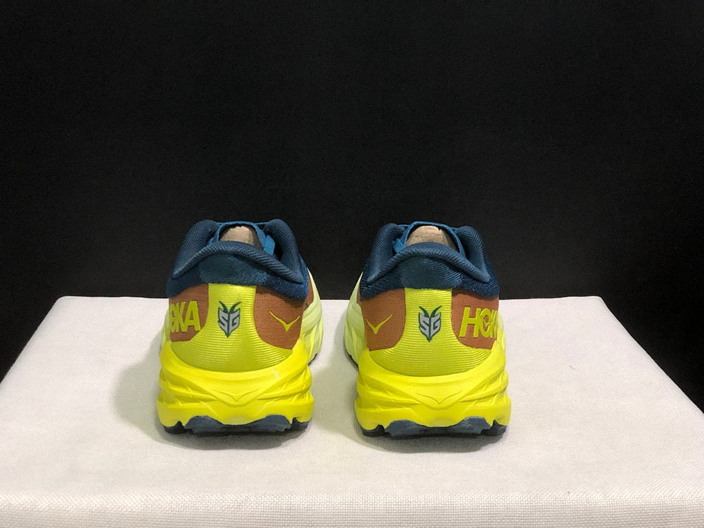 HOKA Speedgoat 6 Trail Running Shoes in Blue Yellow - product image from the listing.